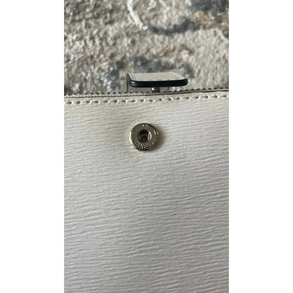 DKNY Bryant Small Crossbody Graffiti print on white bag WOC